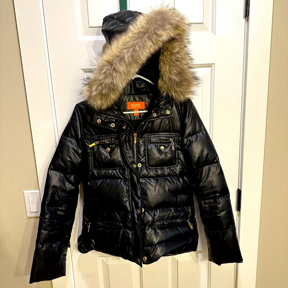 Gently used Kors by Michael Kors jacket. Down with real coyote fur trimmed hood.